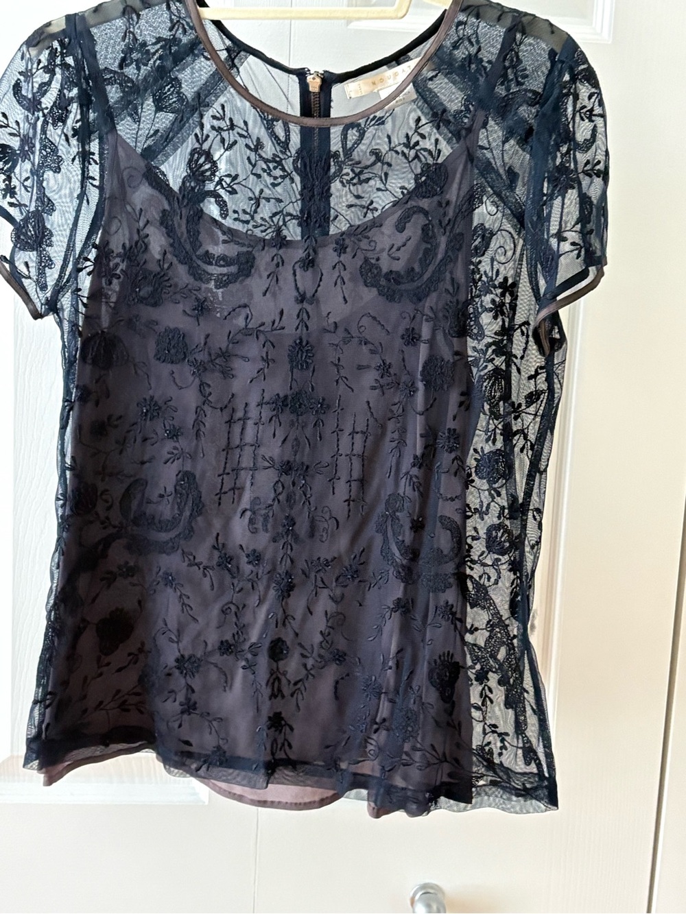 Nougat Sheer Embroidered Short-Sleeve navy top with purple camisole